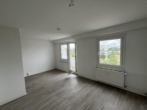 Wohnzimmer - 3-Raum-Wohnung mit Blick über die Stadt!